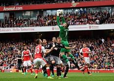 Wenger relieved as late penalty lets Arsenal off the hook