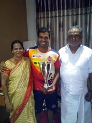 Dhas with his parents