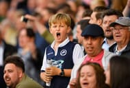 LONDON, ENGLAND - MAY 20: Millwall fans celebrate during the Sky Bet League One Play Off: Second Leg between Millwall and Bradford City at The Den on May 20, 2016 in London, England. (Photo by Justin Setterfield/Getty Images)