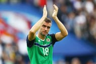 PARIS, FRANCE - JUNE 21: Aaron Hughes of Northern Ireland applauds the supporters after his team's 0-1 defeat in the UEFA EURO 2016 Group C match between Northern Ireland and Germany at Parc des Princes on June 21, 2016 in Paris, France. (Photo by Clive Mason/Getty Images)