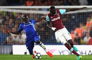 LONDON, ENGLAND - AUGUST 15: N'Golo Kante of Chelsea tackles Cheikhou Kouyate of West Ham United during the Premier League match between Chelsea and West Ham United at Stamford Bridge on August 15, 2016 in London, England. (Photo by Mike Hewitt/Getty Images)