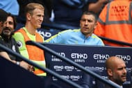 MANCHESTER, ENGLAND - AUGUST 28: Joe Hart of Manchester City looks on from the bench with Aleksander Kolorov and manager Josep Guardiola during the Premier League match between Manchester City and West Ham United at Etihad Stadium on August 28, 2016 in Manchester, England. (Photo by Gareth Copley/Getty Images)