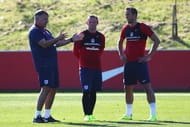 BURTON-UPON-TRENT, ENGLAND - AUGUST 30: Sam Allardyce (L), manager of England talks with Wayne Rooney and Harry Kane during an England training session at St George's Park on August 30, 2016 in Burton-upon-Trent, England. (Photo by Matthew Lewis/Getty Images)