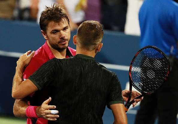 NEW YORK, NY - SEPTEMBER 03:  Stan Wawrinka of Switzerland embraces Daniel Evans of Great Britain after defeating him during their third round Men&#039;s Singles match on Day Six of the 2016 US Open at the USTA Billie Jean King National Tennis Center on September 3, 2016 in the Flushing neighborhood of the Queens borough of New York City.  (Photo by Michael Reaves/Getty Images)