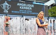 NEW YORK, NY - SEPTEMBER 11: The 2016 US Open Women's Singles champion Angelique Kerber of Germany poses with her trophy by the fountains in the south plaza on Day Fourteen of the 2016 US Open at the USTA Billie Jean King National Tennis Center on September 11, 2016 in the Queens borough of New York City. (Photo by Mike Stobe/Getty Images for USTA)