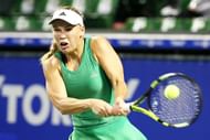 TOKYO, JAPAN - SEPTEMBER 20: Caroline Wozniacki of Denmark competes against Belinda Bencic of Switzerland during women's singles match day two of the Toray Pan Pacific Open at Ariake Colosseum on September 20, 2016 in Tokyo, Japan. (Photo by Koji Watanabe/Getty Images)