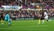 SWANSEA, WALES - SEPTEMBER 24: Raheem Sterling of Manchester City scores his sides third goal during the Premier League match between Swansea City and Manchester City at the Liberty Stadium on September 24, 2016 in Swansea, Wales. (Photo by Michael Steele/Getty Images)