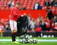 MANCHESTER, ENGLAND - SEPTEMBER 24: Wayne Rooney of Manchester United prepares for warm up as he is dropped to the becnch for the Premier League match between Manchester United and Leicester City at Old Trafford on September 24, 2016 in Manchester, England. (Photo by Laurence Griffiths/Getty Images)
