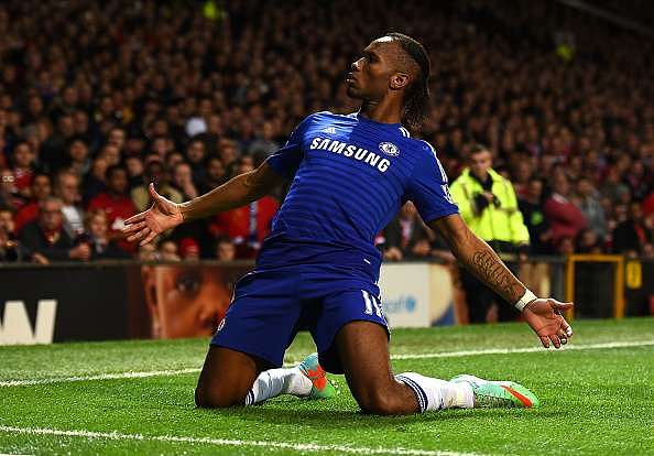 Didier Drogba cools down Theo Walcott's delight after Arsenal's 3