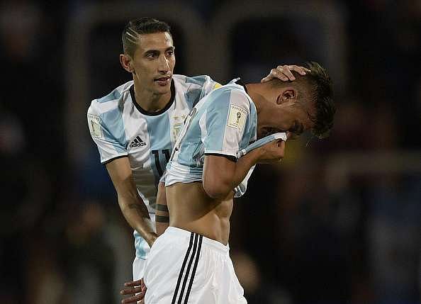 Lionel Messi comforted Paulo Dybala after his red card against Uruguay