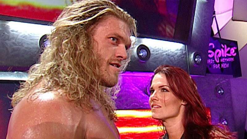 Lita betrays Kane and kisses Edge