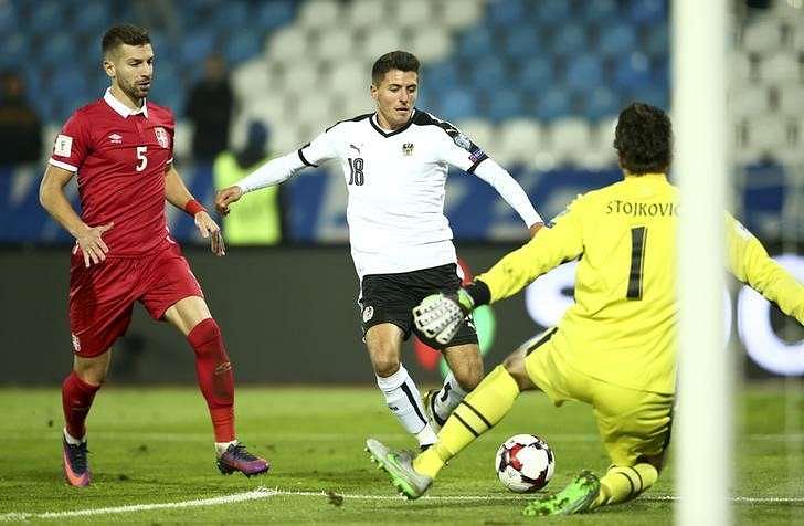 Majestic Tadic steers Serbia to 3-2 win over Austria