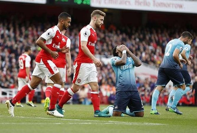 Man City penalty woes allow Arsenal to join them at the top