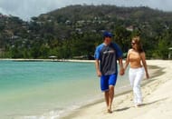 ST. GEORGE'S, GRENADA - MAY 29: Glenn McGrath of Australia with wife Jane on May 29, 2003 on the beach in St. George's, Grenada. (Photo by Hamish Blair/Getty Images)