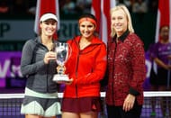 SINGAPORE - NOVEMBER 01: Martina Navratilova (R) poses with Martina Hingis (L) of Switzerland and Sania Mirza (C) of India as they hold up the Martina Navratilova Doubles Trophy after defeating Carla Suarez Navarro and Garbine Muguruza of Spain during the BNP Paribas WTA Finals at Singapore Sports Hub on November 1, 2015 in Singapore. (Photo by Julian Finney/Getty Images)