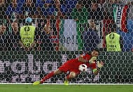 BORDEAUX, FRANCE - JULY 02: Gianluigi Buffon of Italy saves the penalty by Thomas Mueller of Germany at the penalty shootout during the UEFA EURO 2016 quarter final match between Germany and Italy at Stade Matmut Atlantique on July 2, 2016 in Bordeaux, France. (Photo by Alexander Hassenstein/Getty Images)
