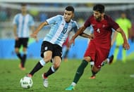 RIO DE JANEIRO, BRAZIL - AUGUST 04: Angel Correa of Argentina and Figueiredo Tobias of Portugal battle for the ball during the Men's Group D first round match between Portugal and Argentina during the Rio 2016 Olympic Games at the Olympic Stadium on August 4, 2016 in Rio de Janeiro, Brazil. (Photo by Matthias Hangst/Getty Images)