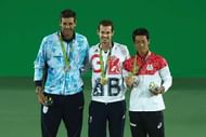 RIO DE JANEIRO, BRAZIL - AUGUST 14: (L-R) Silver medalist Juan Martin Del Potro of Argentina, gold medalist Andy Murray of Great Britain and bronze medalist Kei Nishikori of Japan pose during the medal ceremony for the men's singles on Day 9 of the Rio 2016 Olympic Games at the Olympic Tennis Centre on August 14, 2016 in Rio de Janeiro, Brazil. (Photo by Julian Finney/Getty Images)