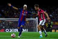 BARCELONA, SPAIN - SEPTEMBER 10: Neymar Jr. of FC Barcelona competes for the ball with Marcos Llorente of Deportivo Alaves during the La Liga match between FC Barcelona and Deportivo Alaves at Camp Nou stadium on September 10, 2016 in Barcelona, Spain. (Photo by David Ramos/Getty Images)