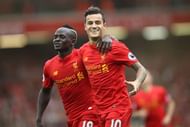 LIVERPOOL, ENGLAND - SEPTEMBER 24: Philippe Coutinho of Liverpool celebrates with Sadio Mane as he scores their fourth goal during the Premier League match between Liverpool and Hull City at Anfield on September 24, 2016 in Liverpool, England. (Photo by Julian Finney/Getty Images)
