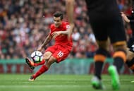 LIVERPOOL, ENGLAND - SEPTEMBER 24: Philippe Coutinho of Liverpool scores their fourth goal during the Premier League match between Liverpool and Hull City at Anfield on September 24, 2016 in Liverpool, England. (Photo by Julian Finney/Getty Images)