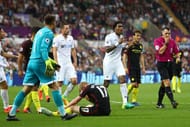 SWANSEA, WALES - SEPTEMBER 24: Leroy Fer of Swansea City (C) argues with referee Neil Swarbrick after he awarded Manchester City a penalty for a foul on Kevin De Bruyne of Manchester City during the Premier League match between Swansea City and Manchester City at the Liberty Stadium on September 24, 2016 in Swansea, Wales. (Photo by Michael Steele/Getty Images)
