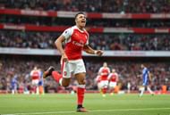 LONDON, ENGLAND - SEPTEMBER 24: Alexis Sanchez of Arsenal celebrates scoring his sides first goal during the Premier League match between Arsenal and Chelsea at the Emirates Stadium on September 24, 2016 in London, England. (Photo by Paul Gilham/Getty Images)