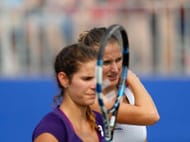 WUHAN, CHINA - SEPTEMBER 25: (L to R)Julia Goerges of Germany and Karolina Pliskova of Czech Republic speaks to each other in a double match against Chang Liu and Kai-Lin Zhang of China during Day 1 of the 2016 Wuhan Open at Optics Valley International Tennis Center on September 25, 2016 in Wuhan, China. (Photo by Kevin Lee/Getty Images)