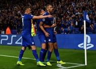LEICESTER, ENGLAND - SEPTEMBER 27: Islam Slimani of Leicester City (R) celebrates with team mates as he scores their first goal during the UEFA Champions League Group G match between Leicester City FC and FC Porto at The King Power Stadium on September 27, 2016 in Leicester, England. (Photo by Shaun Botterill/Getty Images)