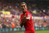 SWANSEA, WALES - OCTOBER 01: Roberto Firmino of Liverpool celebrates scoring his sides first goal during the Premier League match between Swansea City and Liverpool at Liberty Stadium on October 1, 2016 in Swansea, Wales. (Photo by Julian Finney/Getty Images)
