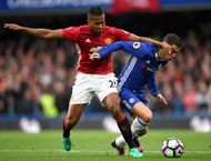 LONDON, ENGLAND - OCTOBER 23: Eden Hazard of Chelsea is closed down by Antonio Valencia of Manchester United during the Premier League match between Chelsea and Manchester United at Stamford Bridge on October 23, 2016 in London, England. (Photo by Shaun Botterill/Getty Images)