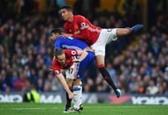 LONDON, ENGLAND - OCTOBER 23: Chris Smalling of Manchester United and Daley Blind of Manchester United tackle Diego Costa of Chelsea during the Premier League match between Chelsea and Manchester United at Stamford Bridge on October 23, 2016 in London, England. (Photo by Mike Hewitt/Getty Images)