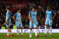 MANCHESTER, ENGLAND - OCTOBER 26: Sergio Aguero of Manchester City (C) and his Manchester City team mates show dejection after the final whistle during the EFL Cup fourth round match between Manchester United and Manchester City at Old Trafford on October 26, 2016 in Manchester, England. (Photo by Michael Steele/Getty Images)