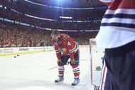 Chicago Blackhawks Niklas Hjalmarsson (4) victorious, looking exhausted after winning series vs Tampa Bay Lightning at United Center