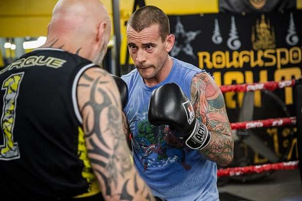 MMA News: CM Punk hellbent on continuing his MMA career! Back in the gym!