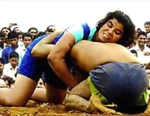 18-year-old female wrestler Neha Tomar defeats male wrestling champion