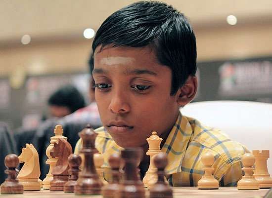 Indian chess prodigy Rameshbabu Praggnanandhaa smiles as his