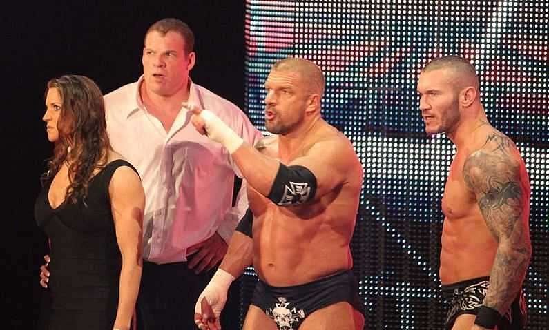 Stephanie as part of The Authority stable along with Triple H, Kane and Randy Orton