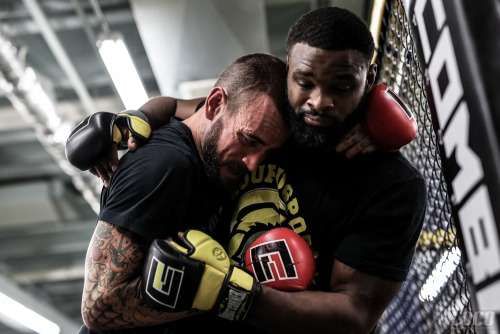 MMA News: Tyron Woodley suggests an opponent for CM Punk's second UFC fight!