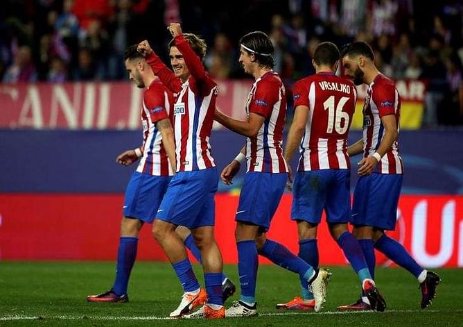 Griezmann's late goal takes Atletico through to last 16