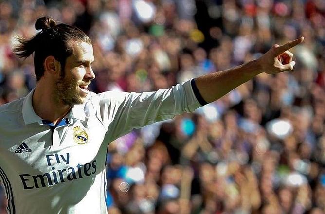 Bale double helps La Liga leaders Real see off Leganes
