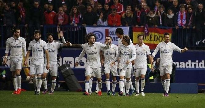 Real race clear as Ronaldo treble sinks Atletico