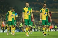 NORWICH, ENGLAND - MAY 11: Norwich City players applaud supporters following relegation during the Barclays Premier League match between Norwich City and Watford at Carrow Road on May 11, 2016 in Norwich, England. (Photo by Stephen Pond/Getty Images)