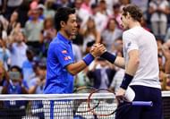NEW YORK, NY - SEPTEMBER 07: Kei Nishikori of Japan (L) shakes hands with Andy Murray of Great Britain after defeating him during their Men's Singles Quarterfinal match on Day Ten of the 2016 US Open at the USTA Billie Jean King National Tennis Center on September 7, 2016 in the Flushing neighborhood of the Queens borough of New York City. (Photo by Mike Hewitt/Getty Images)