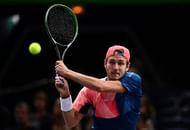 PARIS, FRANCE - NOVEMBER 02: Lucas Pouille of France plays a backhand against Feliciano Lopez of Spain during the Mens Singles second round match on day three of the BNP Paribas Masters at Palais Omnisports de Bercy on November 2, 2016 in Paris, France. (Photo by Dan Mullan/Getty Images)