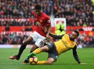 MANCHESTER, ENGLAND - NOVEMBER 19: Marcus Rashford of Manchester United (L) is tackled by Francis Coquelin of Arsenal (R) during the Premier League match between Manchester United and Arsenal at Old Trafford on November 19, 2016 in Manchester, England. (Photo by Shaun Botterill/Getty Images)