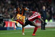 SUNDERLAND, ENGLAND - NOVEMBER 19: Patrick van Aanholt of Sunderland in action with Dieumerci Mbokani of Hull City during the Barclays Premier League match between Sunderland and Hull City at the Stadium of Light on November 19, 2016 in Sunderland, England. (Photo by Chris Brunskill/Getty Images)