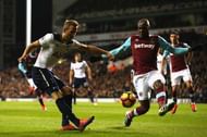 LONDON, ENGLAND - NOVEMBER 19: Harry Kane of Tottenham Hotspur (L) shoots while Angelo Ogbonna of West Ham United (R) attempts to block during the Premier League match between Tottenham Hotspur and West Ham United at White Hart Lane on November 19, 2016 in London, England. (Photo by Dean Mouhtaropoulos/Getty Images)