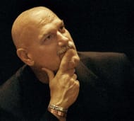 377974 03: Minnesota Governor Jesse Ventura pauses for a moment as he recognizes a friend while signing copies of his new book 'Do I Stand Alone?' September 8, 2000 at Skokie School in Winnetka, IL. Governor Ventura spoke earlier to a small audience touching on various topics including politics and life after professional wrestling. (Photo by Tim Boyle/Newsmakers)