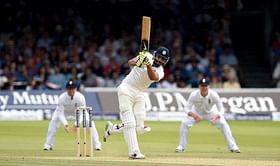 Ravindra Jadeja brings out the sword celebration on reaching his fifty during the Mohali Test